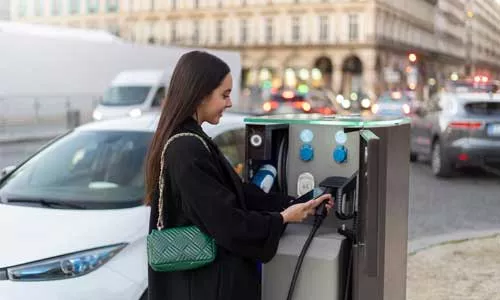 Customer Charging their Electric Vehicle in Fairway EV Charging Station