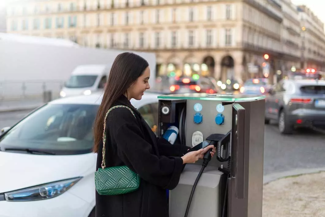 Customer Charging their Electric Vehicle in Fairway EV Charging Station